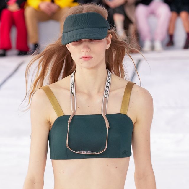 a lacoste model wears a crop top and visor in a roundup of the best visors for women