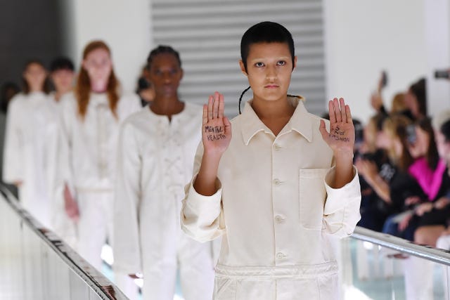 Model Ayesha Tan Jones Protests Gucci S Straitjacket While Walking Runway
