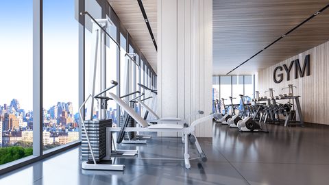modern gym interior with city view , 3d rendering