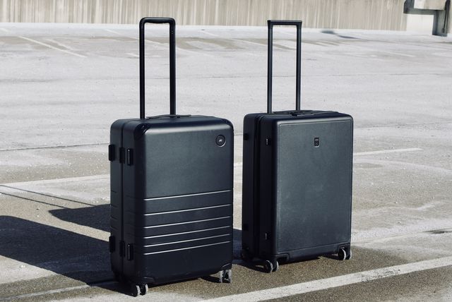 two suitcases positioned alongside each other