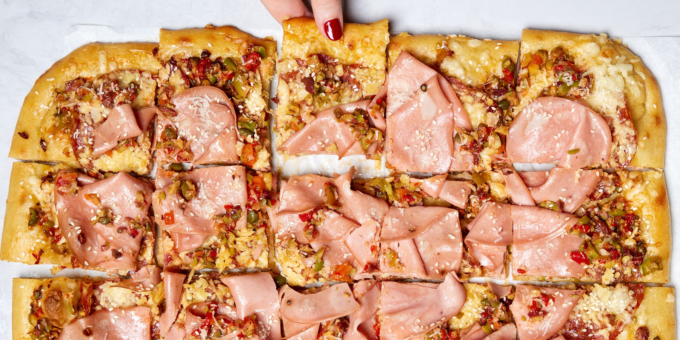 Muffuletta Pizza Transforms The Classic Sandwich Into A Party Favorite