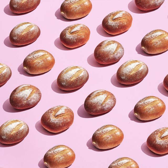 bread rolls on a pink background