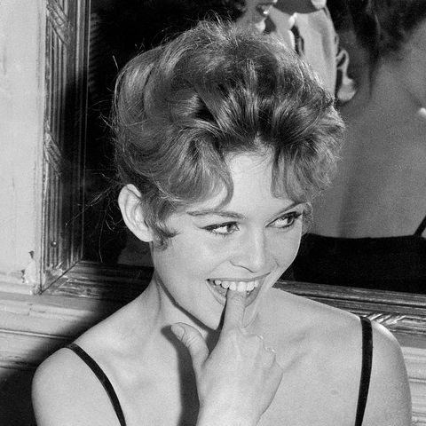 brigitte bardot with her finger in mouth