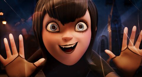 mavis selena gomez looks into a shop window with delight as she enters the human village for the first time in hotel transylvania, an animated comedy from sony pictures animation