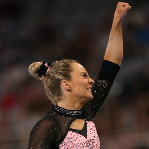 2021 U.S. Gymnastics Championships - Day 4 mykayla skinner fist pumping in a black and pink sparkly leotard