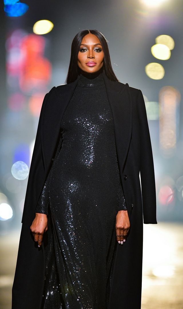 new york, new york   april 08  naomi campbell walks along 46th street during the michael kors fashion show in times square on april 08, 2021 in new york city photo by james devaneygc images