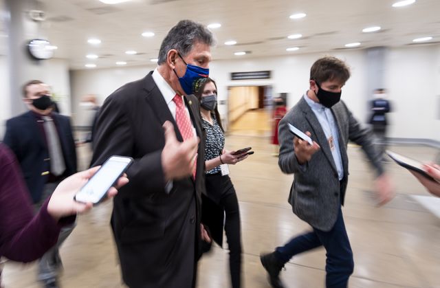 united states   march 24 sen joe manchin, d w va, speaks with reporters in the senate subway as he arrives for a vote in the capitol on wednesday, march 24, 2021 photo by bill clarkcq roll call, inc via getty images