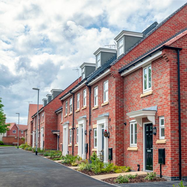 a row of newly built houses, built to a traditional brick design in the north of england