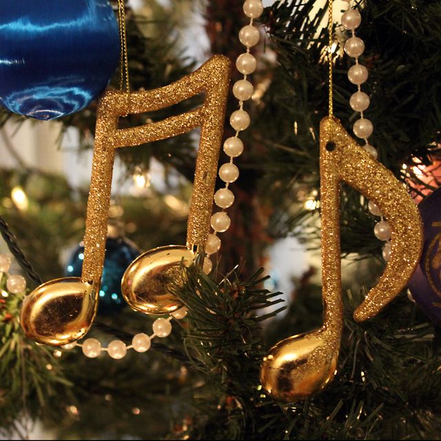 Gold Musical Note Ornaments Hanging on Christmas Tree