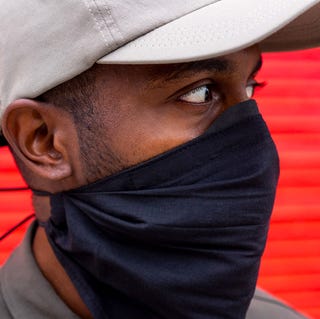 innovative face masks a man wearing a bandana style face mask