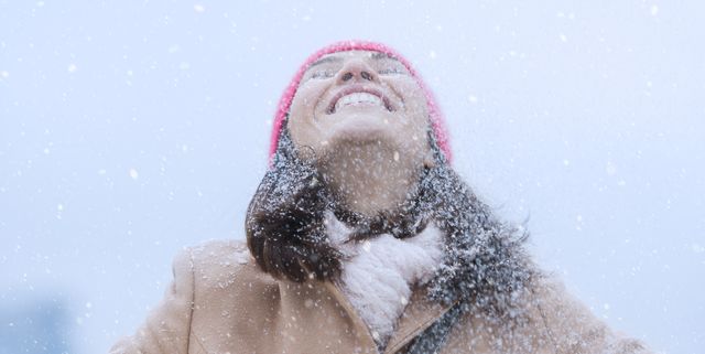 usa, new jersey, jersey city, woman in snowfall