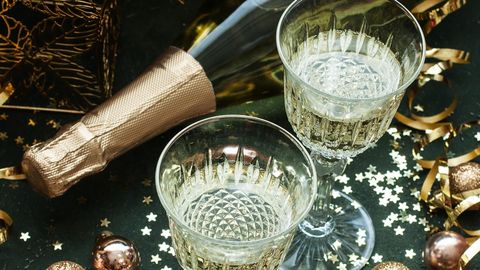 new years  celebration background with champagne bottle and glasses