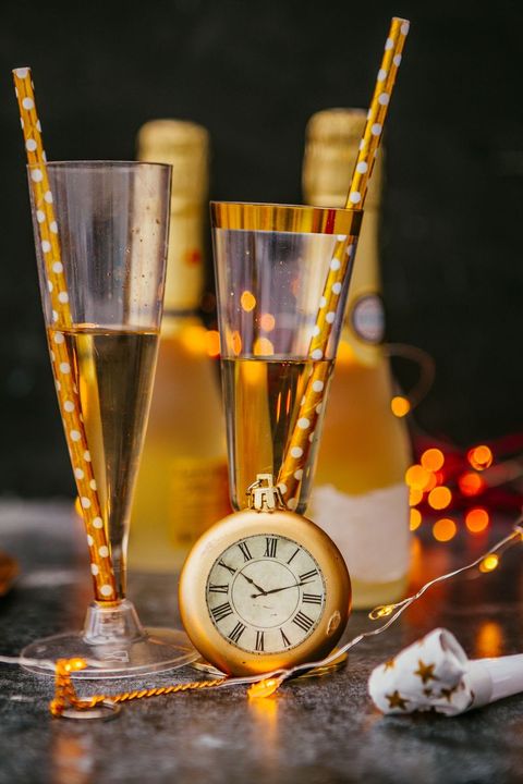 gold watch and champagne glasses