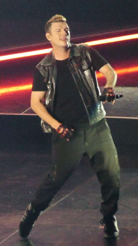 singer nick carter performing with backstreet boys in london