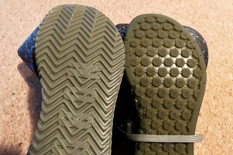 soles of two nobull shoes