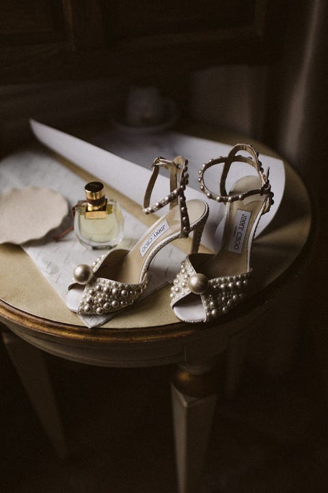 The Spanish bride in a Cherubina dress and pearl sandals The Spanish bride with a cherubin dress and pearl sandals