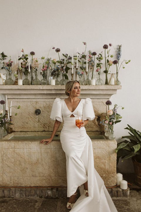 The Spanish bride in a Cherubina dress and pearl sandals The Spanish bride with a cherubin dress and pearl sandals