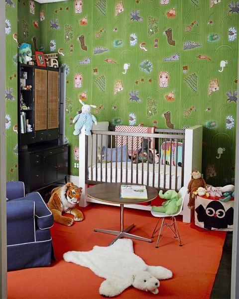 gender neutral nurseries with green wallpaper and orange carpet
