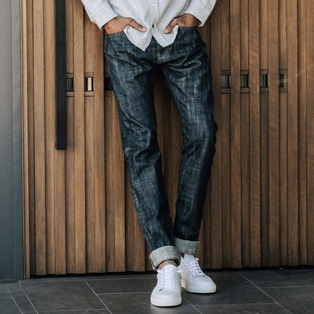 a model wearing a pair of jeans