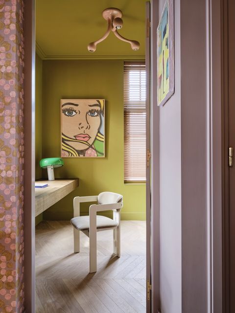 amsterdam home of actor carice van houten designed by nicole dohmen of atelier nd interior study chartreuse paint a custom blend by ijm studio is perfect in pearce’s office, just off a lilac hall desk custom lamp flos art clients’ own
