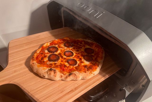 a pepperoni pizza cooked in the ooni volt 12 electric pizza oven