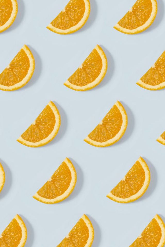 Orange Slice Pattern on Blue Background