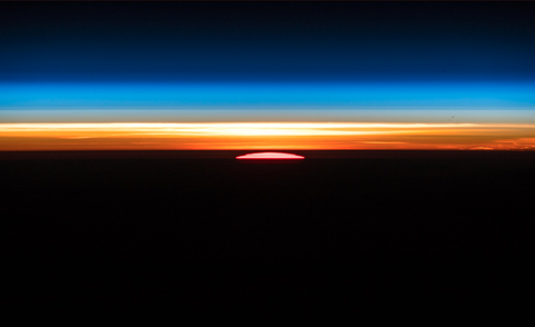Orbital sunrise from ISS photo