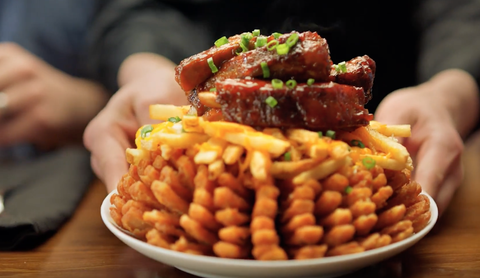 Updated Outback S New Loaded Bloomin Onion Is Topped With Ribs