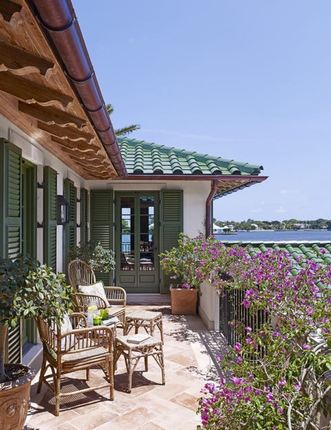outdoor garden room green shutters