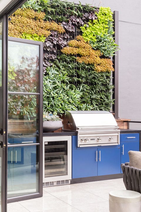 blue outdoor grilling and patio area