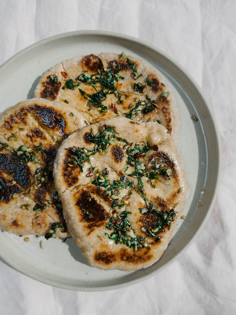 Simple flatbreads with a spiced garlic and mint butter