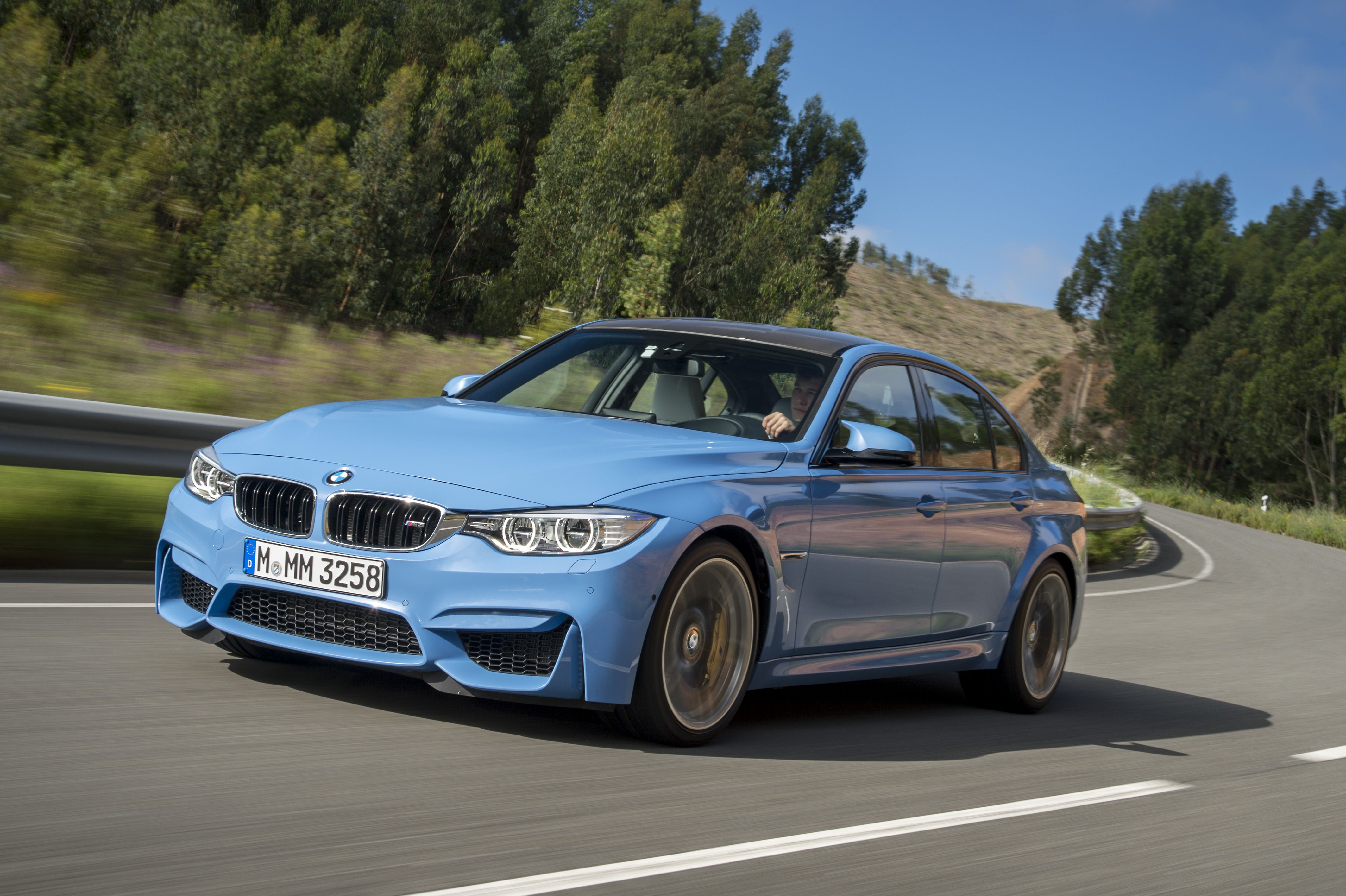 light blue car with yellow stripe