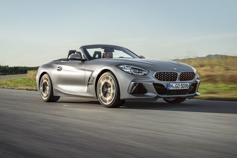 bmw z4 driving on a rural road