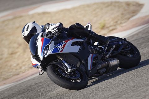 bmw s 1000 r motorcycle being driven hard around a corner on track