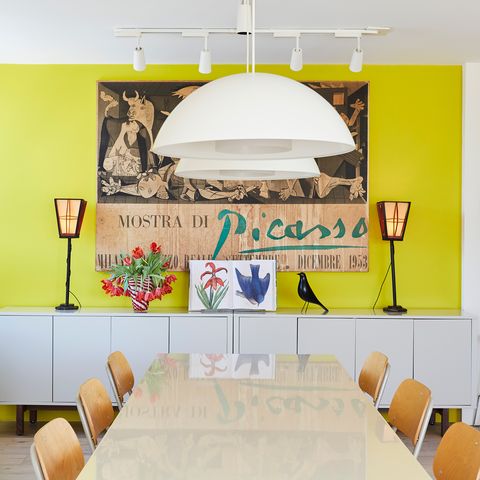 dining area with neon yellow accent wall