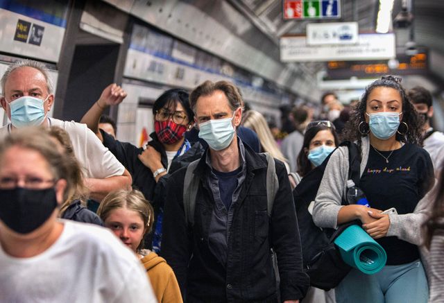 passengers seen wearing facemasks on a busy oxford circus