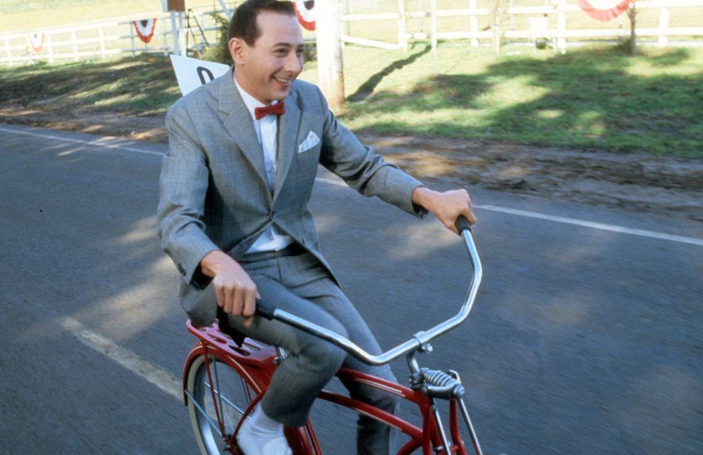 paul-reubens-rides-a-bike-in-a-scene-fro