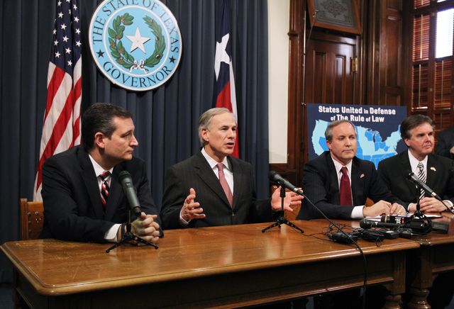 austin, tx    february 18  texas governor greg abbott 2nd l speaks alongside us sen ted cruz r tx l, attorney general ken paxton 2nd r, lieutenant governor dan patrick r hold a joint press conference february 18, 2015 in austin, texas  the press conference addressed the united states district court for the southern district of texas' decision on the lawsuit filed by a texas led coalition of 26 states challenging president obama's executive action on immigration  photo by erich schlegelgetty images