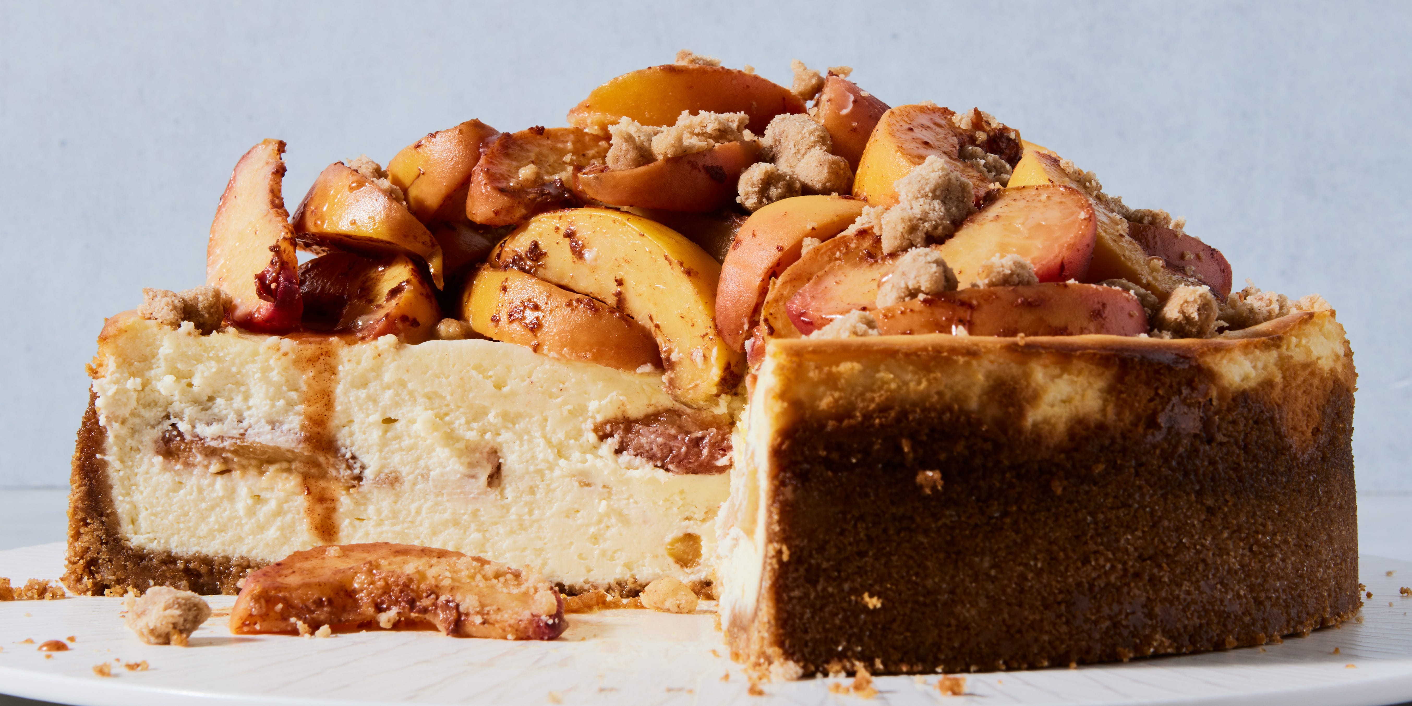 Why Choose One Dessert When This Peach Cobbler Cheesecake Lets You Have It All?