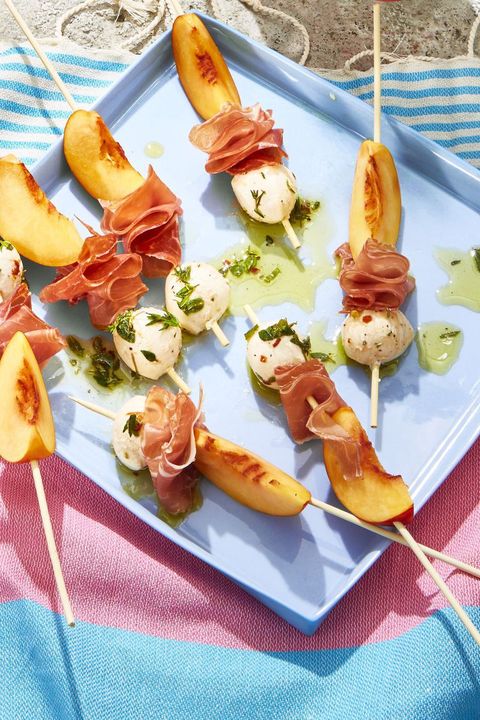 new year's eve appetizers   peach and prosciutto skewers