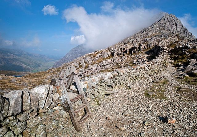 peak of tryfan with nant ffrancon valley in the distance viewed from bwlch tryfan in the glyderau mountains of snowdonia