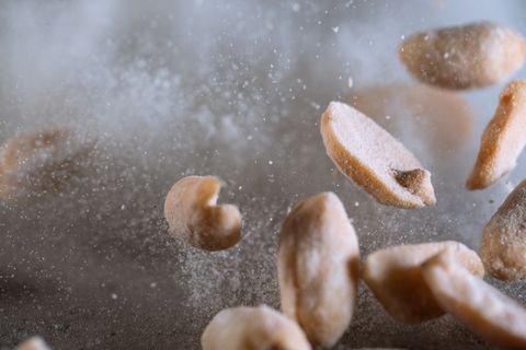 peanuts roasted with salt jumping captured with high speed shutter