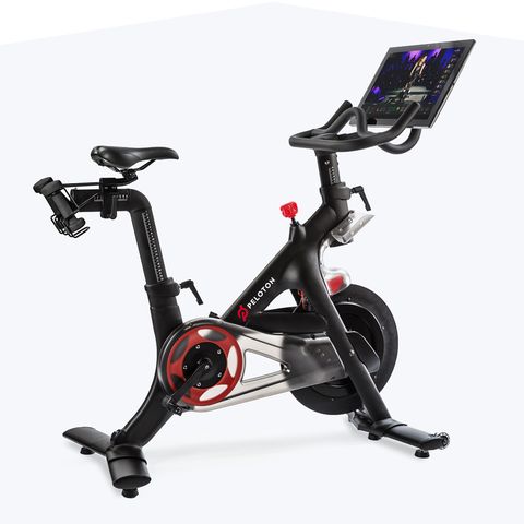 Indoor cycling, Stationary bicycle, Exercise equipment, Exercise machine, Bicycle accessory, Bicycle, Vehicle, Sports equipment, Exercise, Font, 