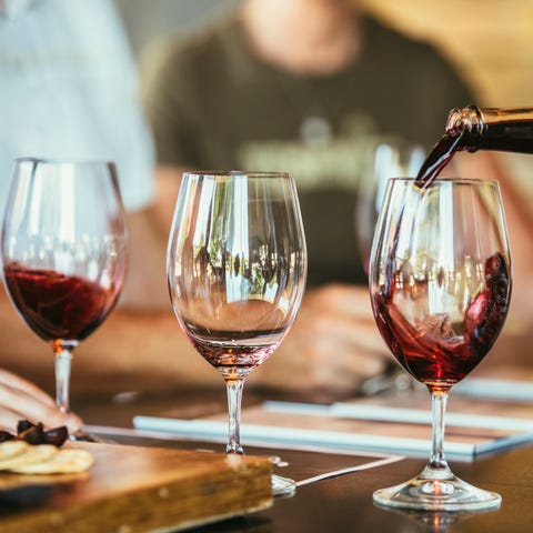 People drinking wine together in bar