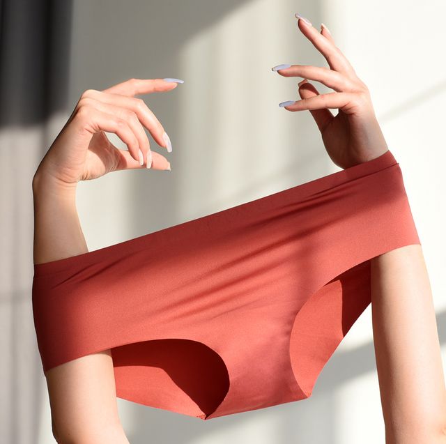 red underwear stretched between two arms