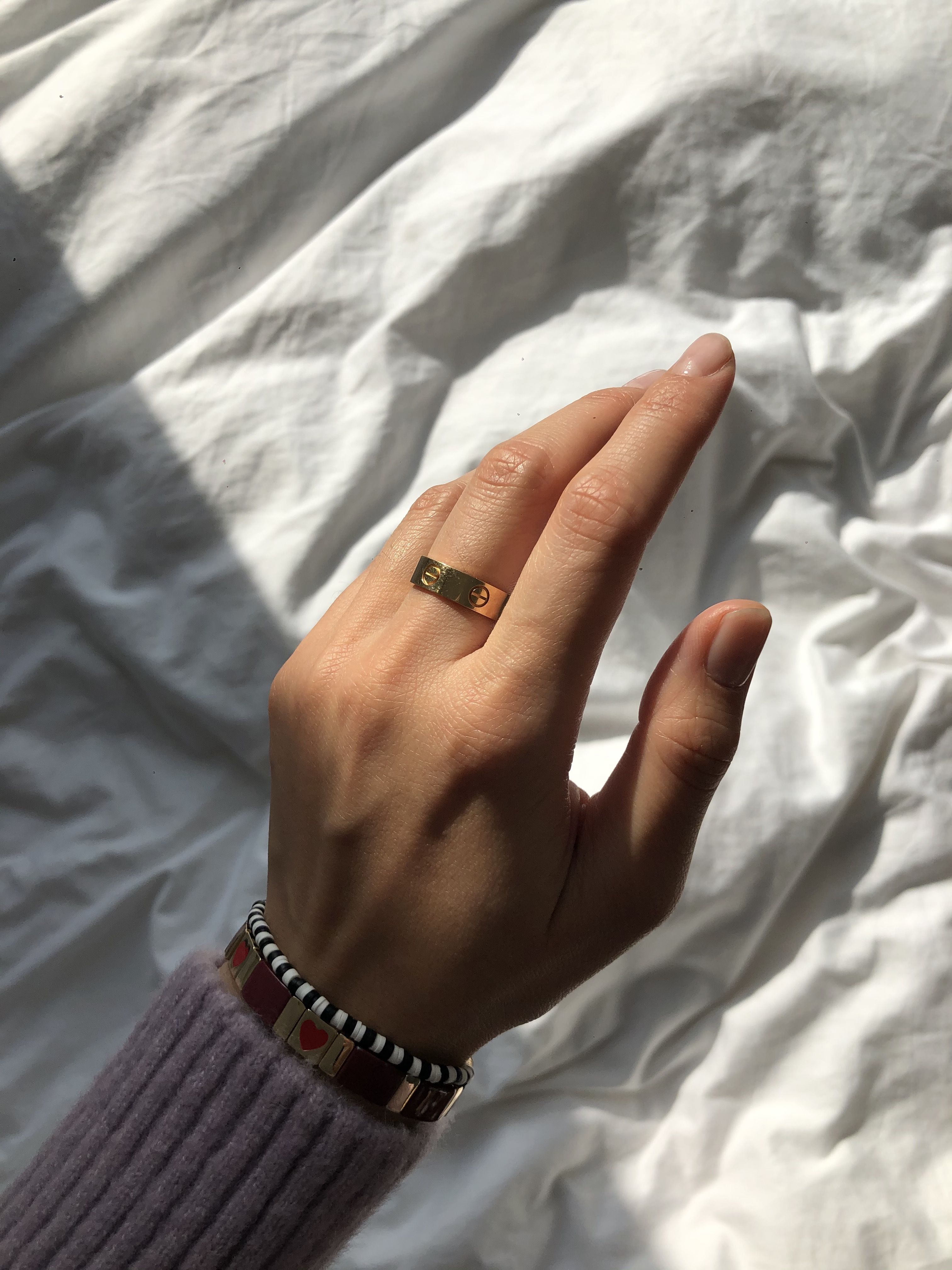 cartier ring on hand