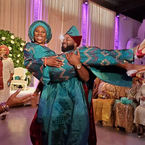 luvvie and her husband at their twopart wedding day in 2019 with the 1st part  including nigerian customs and the 2nd  western