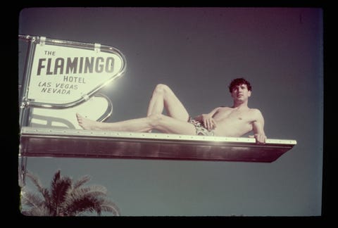 rock hudson lounging on a diving board