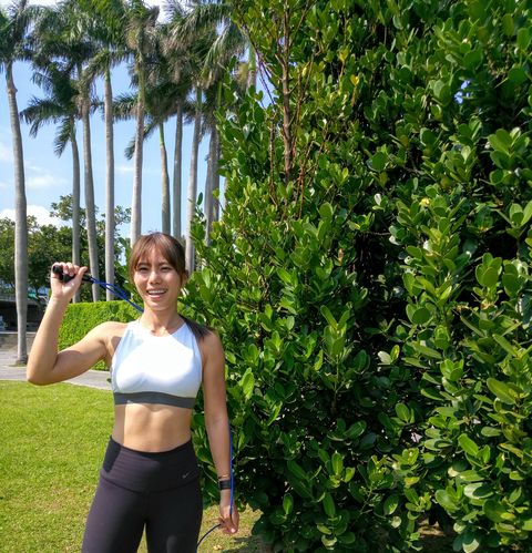 Shoulder, Tree, Abdomen, Arm, Woody plant, Plant, Trunk, Physical fitness, Joint, Sports bra, 