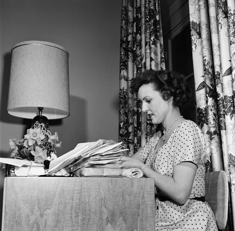 vintage photos of celebrities at home   betty white at a desk